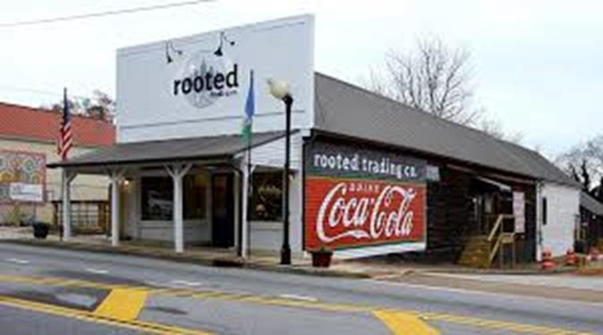 An image of historic store in powder springs GA with a Coca-Cola sign on the side